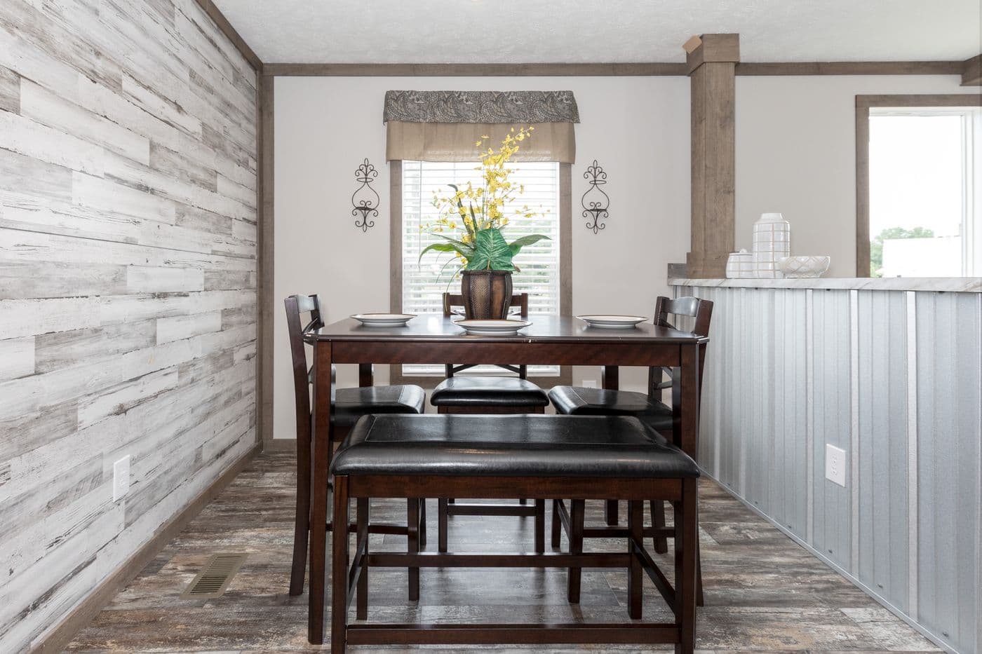 The THE WALSH Dining Area. This Manufactured Mobile Home features 3 bedrooms and 2 baths.