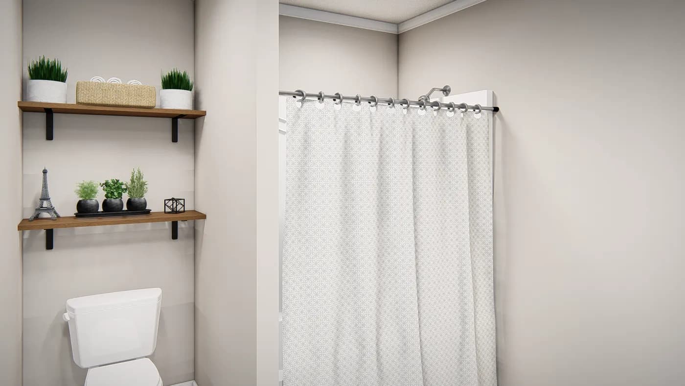The THE VALHALLA Guest Bathroom. This Manufactured Mobile Home features 3 bedrooms and 2 baths.