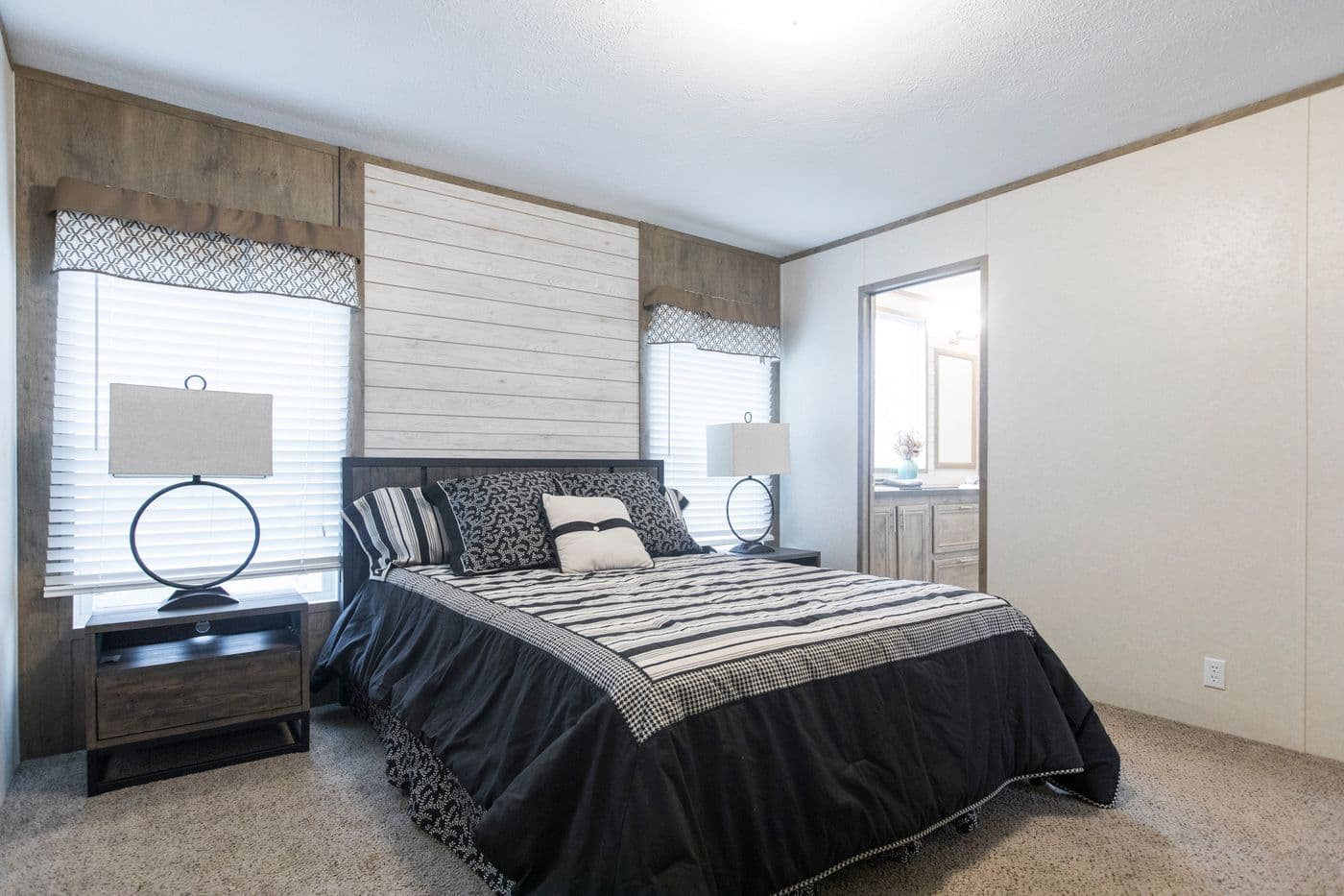 The THE SOUTHERN FARMHOUSE Primary Bathroom. This Manufactured Mobile Home features 3 bedrooms and 2 baths.