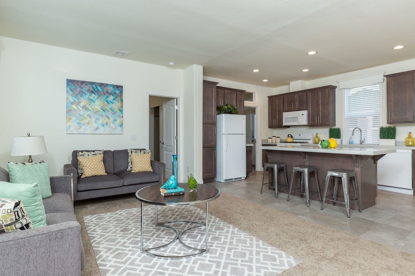 The FAIRPOINT 24564A Living Room. This Manufactured Mobile Home features 4 bedrooms and 2 baths.