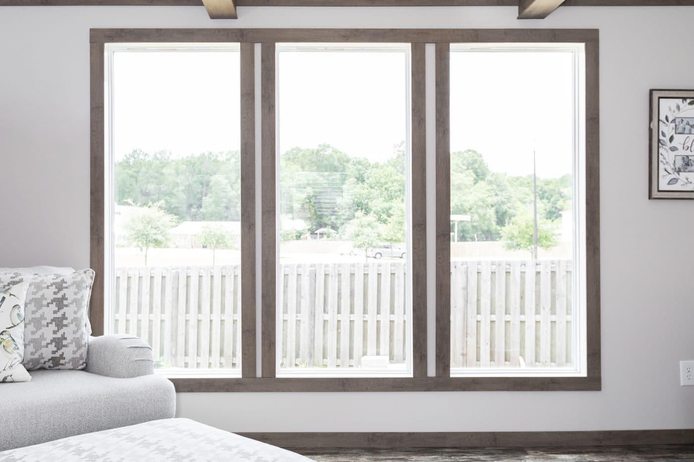 The THE WALSH Living Room. This Manufactured Mobile Home features 3 bedrooms and 2 baths.