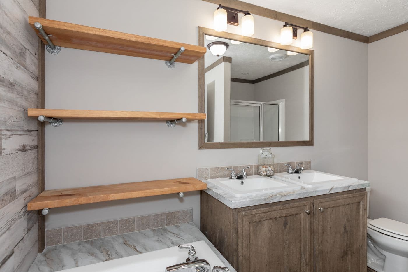 The THE WALSH Primary Bathroom. This Manufactured Mobile Home features 3 bedrooms and 2 baths.