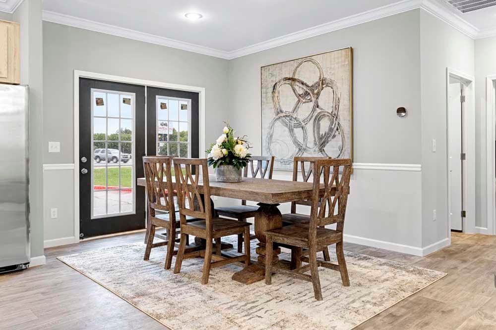 The THE TILLEY Dining Area. This Manufactured Mobile Home features 3 bedrooms and 2 baths.