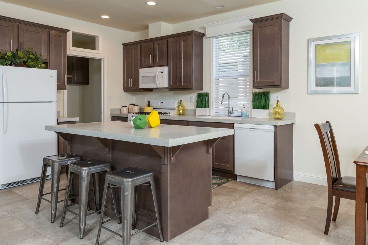 The FAIRPOINT 24623A Kitchen. This Manufactured Mobile Home features 3 bedrooms and 2 baths.