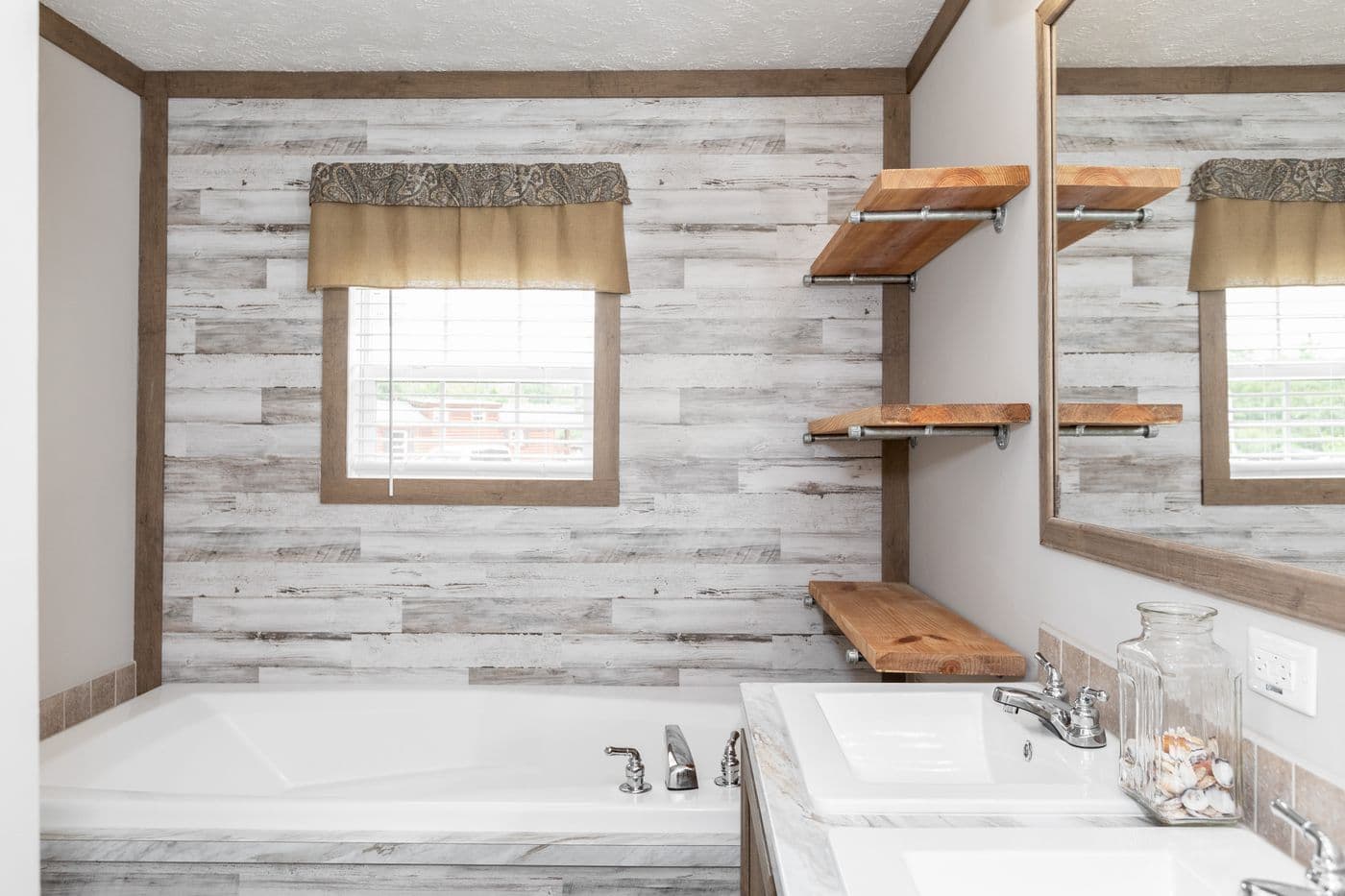 The THE WALSH Primary Bathroom. This Manufactured Mobile Home features 3 bedrooms and 2 baths.