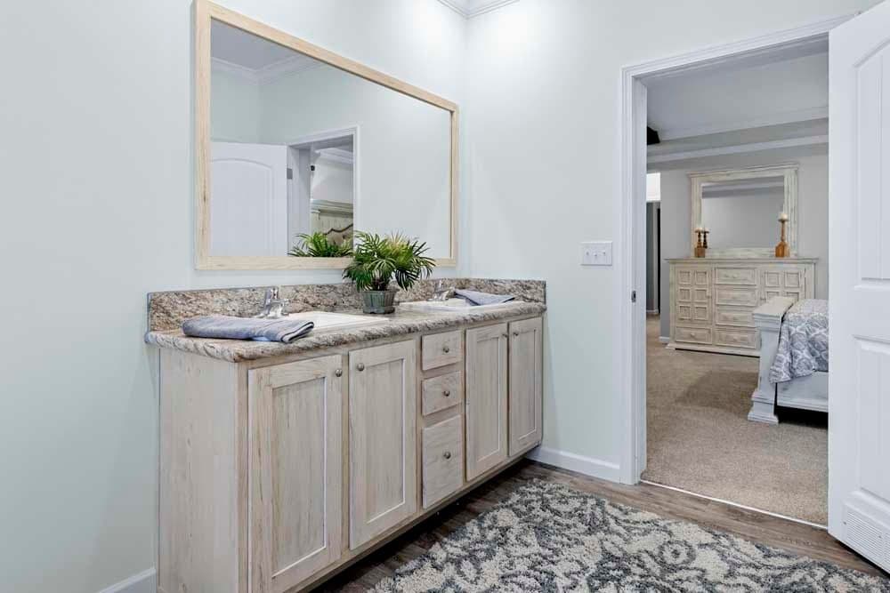 The THE TILLEY Primary Bathroom. This Manufactured Mobile Home features 3 bedrooms and 2 baths.