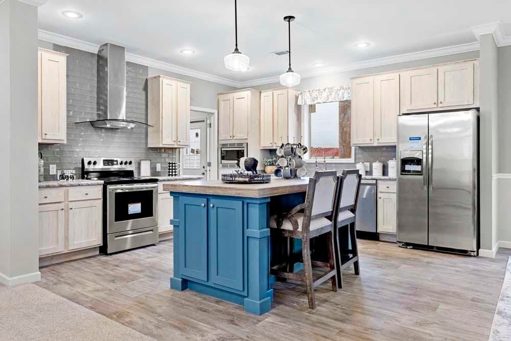 The THE TILLEY Kitchen. This Manufactured Mobile Home features 3 bedrooms and 2 baths.