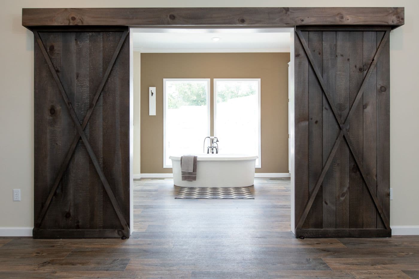 The SOUTHERN CHARM 4 BR Primary Bathroom. This Manufactured Mobile Home features 4 bedrooms and 2 baths.