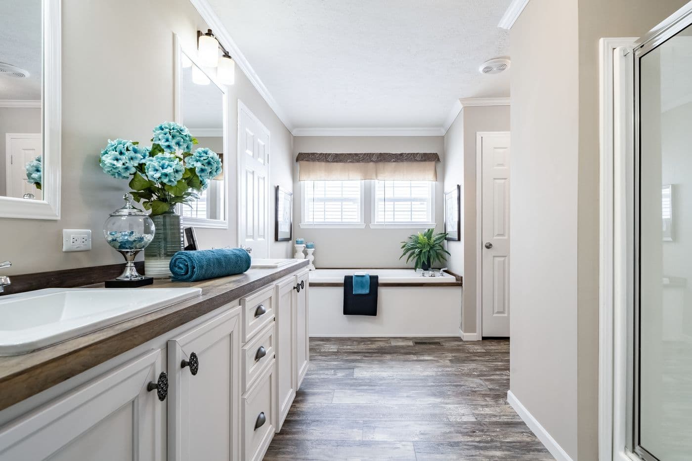 The THE RODDY Primary Bathroom. This Manufactured Mobile Home features 4 bedrooms and 3 baths.