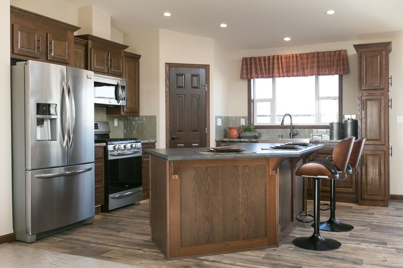 The INTEGRITY 98 MOD Kitchen. This Manufactured Mobile Home features 2 bedrooms and 2 baths.