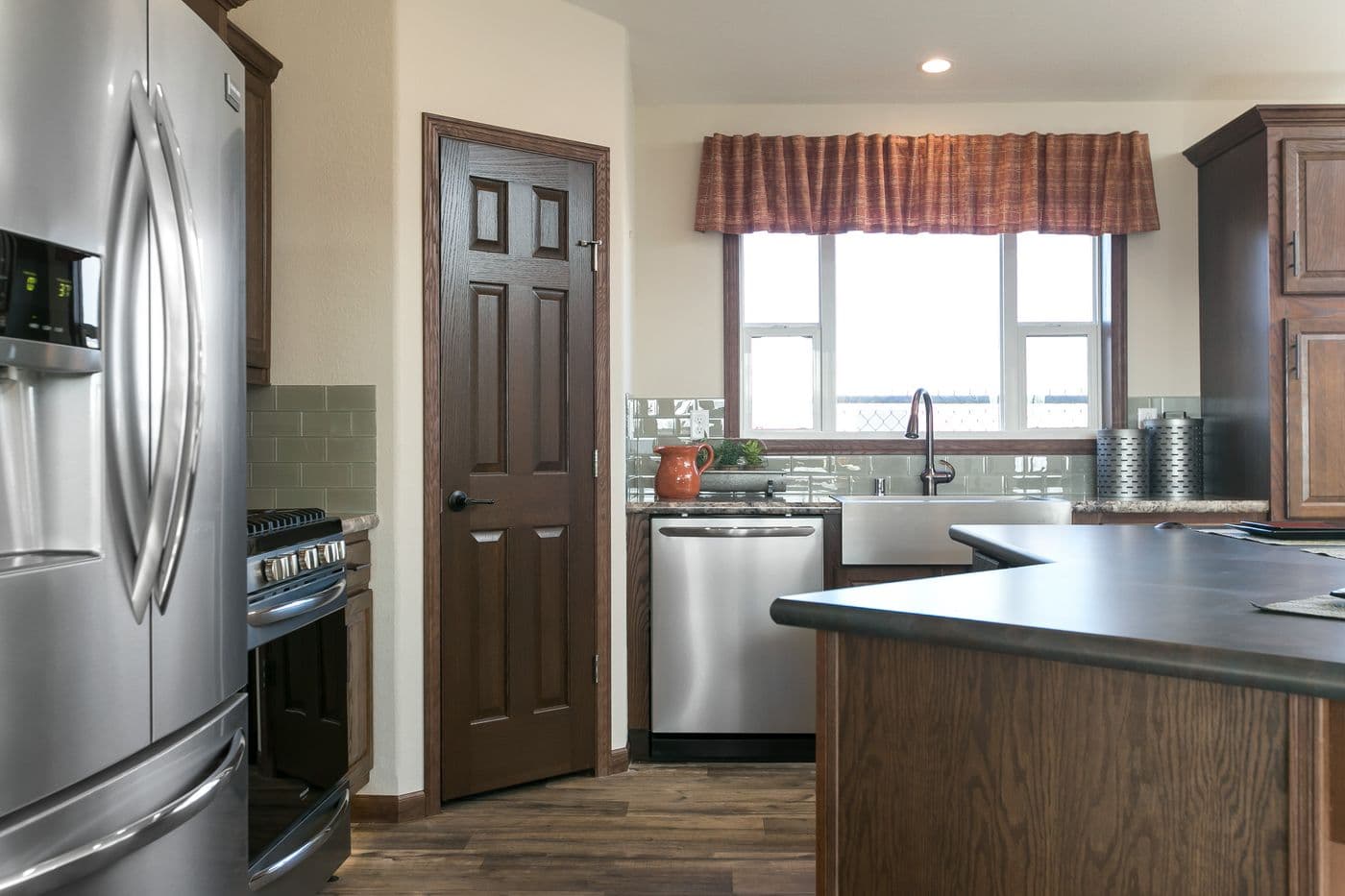 The INTEGRITY 98 MOD Kitchen. This Manufactured Mobile Home features 2 bedrooms and 2 baths.