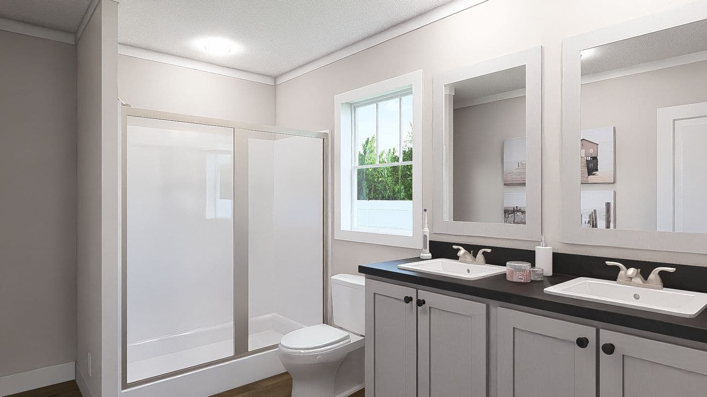 The THREE LITTLE BIRDS Exterior. This Manufactured Mobile Home features 3 bedrooms and 2 baths.