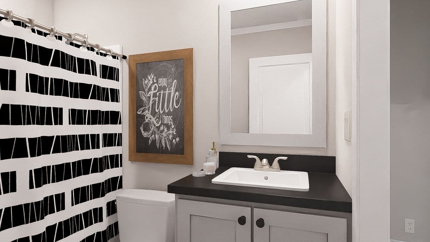 The MY GIRL Exterior. This Manufactured Mobile Home features 3 bedrooms and 2 baths.