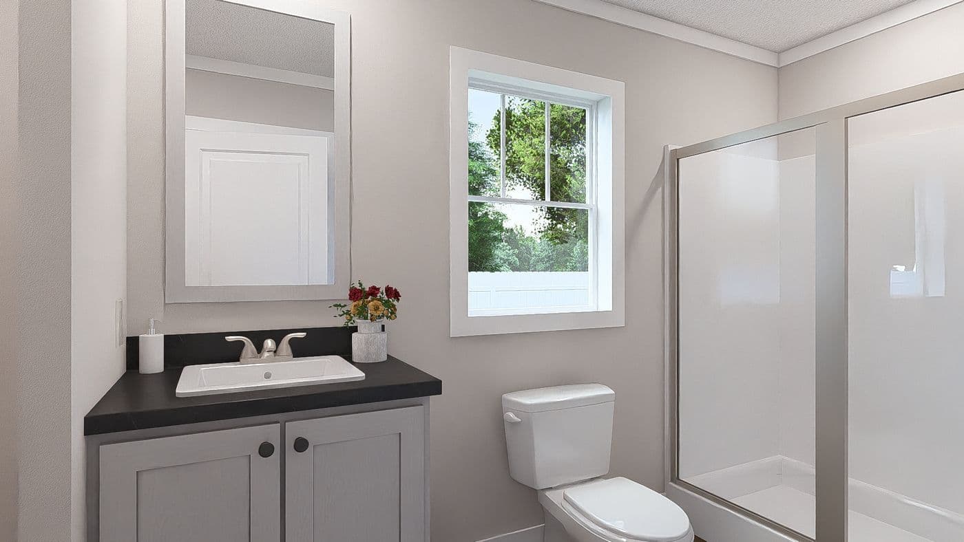 The MOVE ON UP Exterior. This Manufactured Mobile Home features 3 bedrooms and 2 baths.