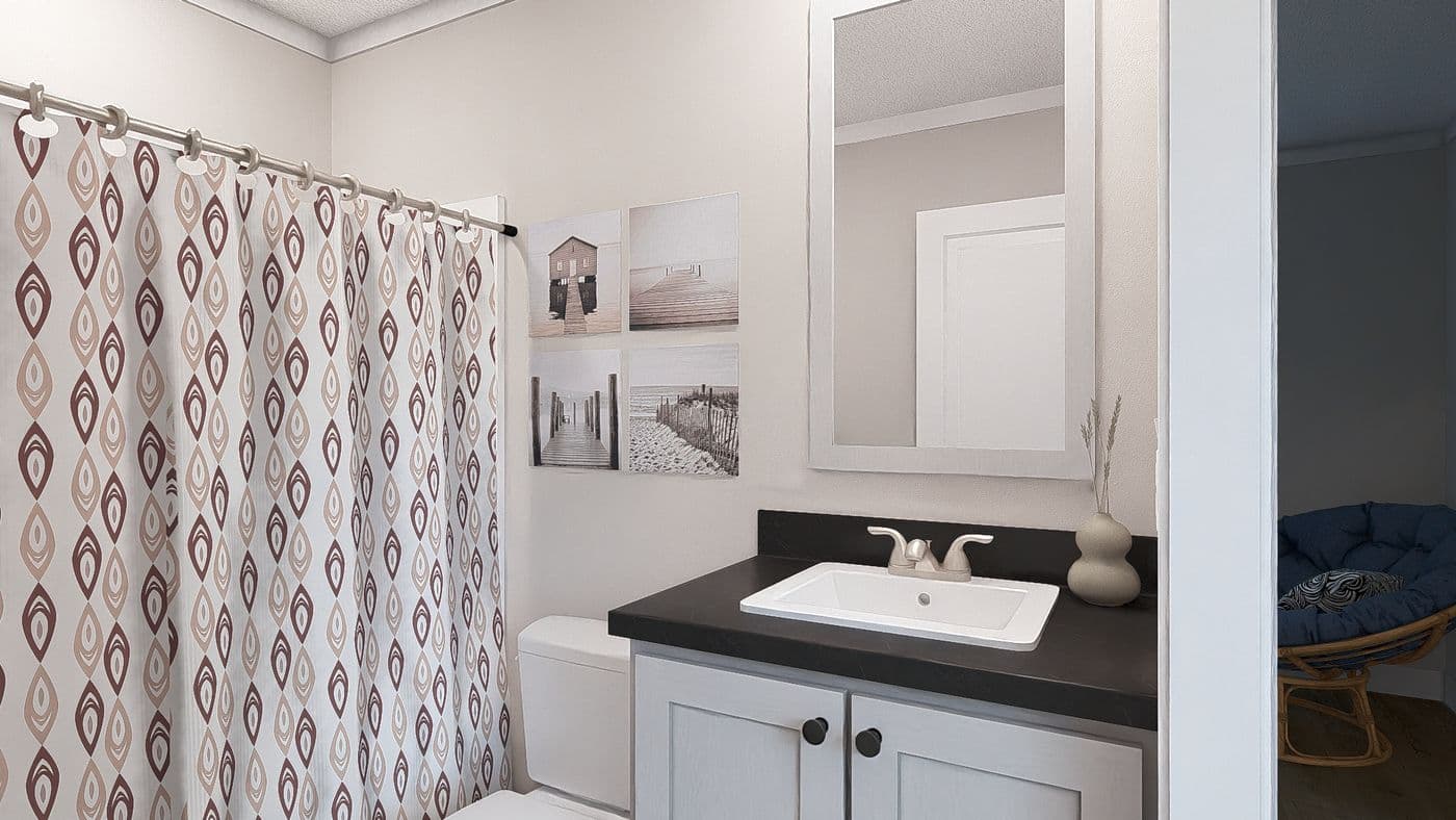 The SWEET CAROLINE Exterior. This Manufactured Mobile Home features 3 bedrooms and 2 baths.