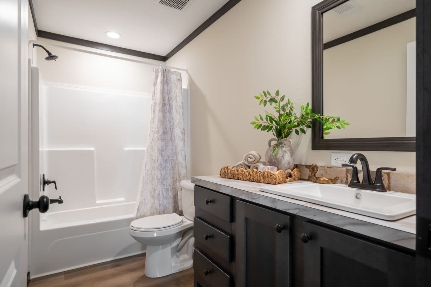 The THE VOGUE 60 Exterior. This Manufactured Mobile Home features 3 bedrooms and 2 baths.