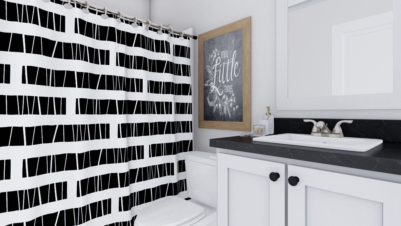 The MY GIRL Exterior. This Manufactured Mobile Home features 3 bedrooms and 2 baths.