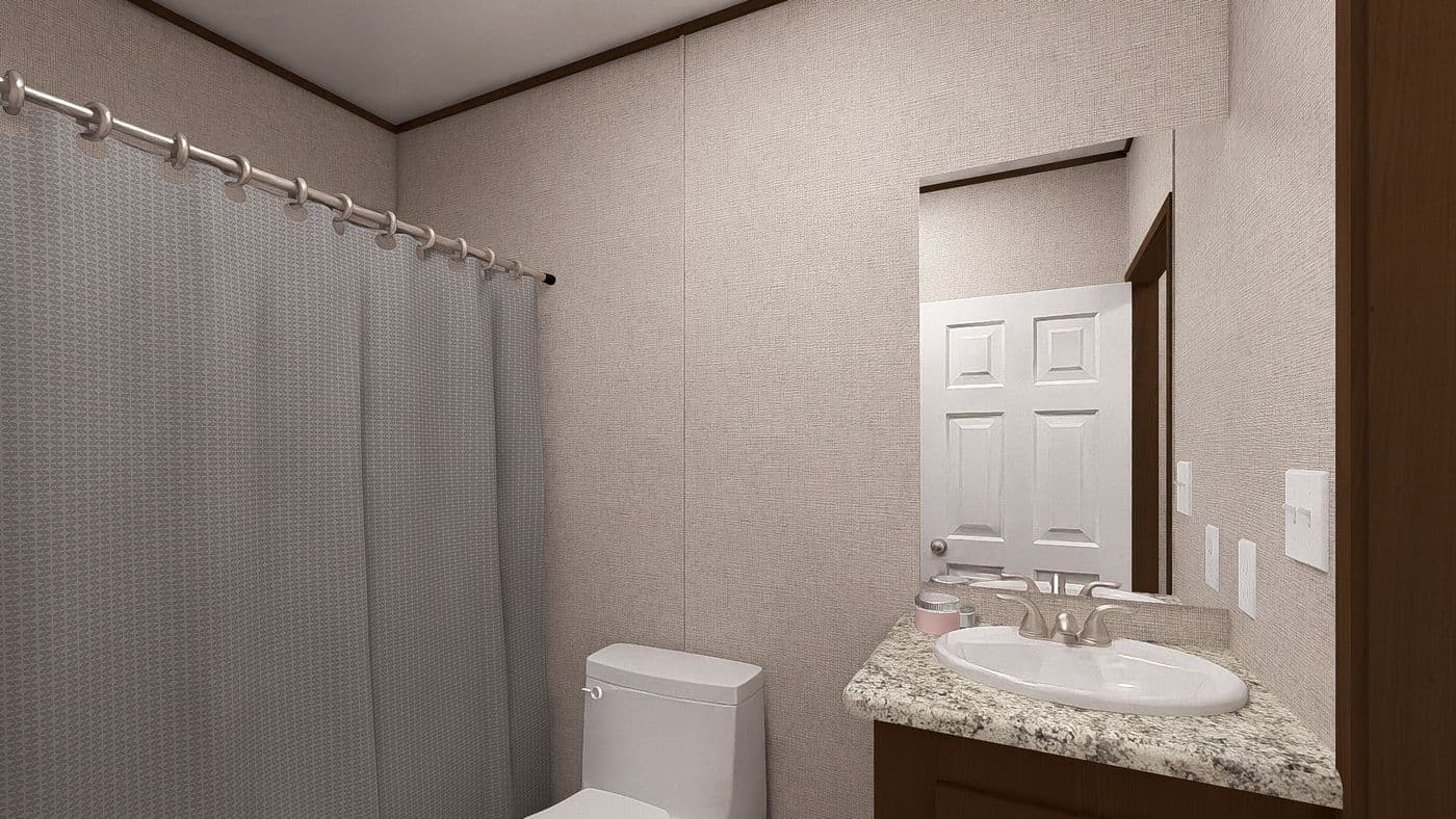 The CEDAR Exterior. This Manufactured Mobile Home features 3 bedrooms and 2 baths.