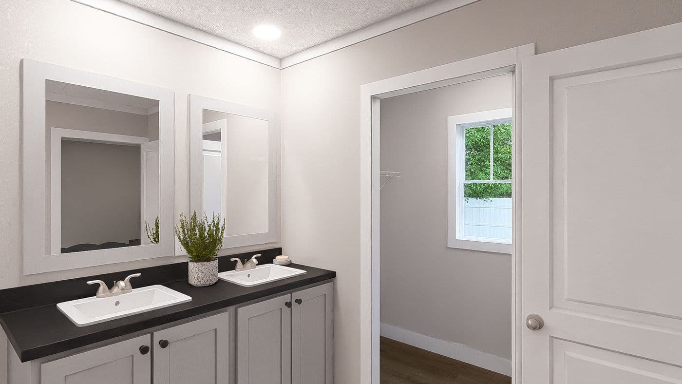The SWEET CAROLINE Exterior. This Manufactured Mobile Home features 3 bedrooms and 2 baths.
