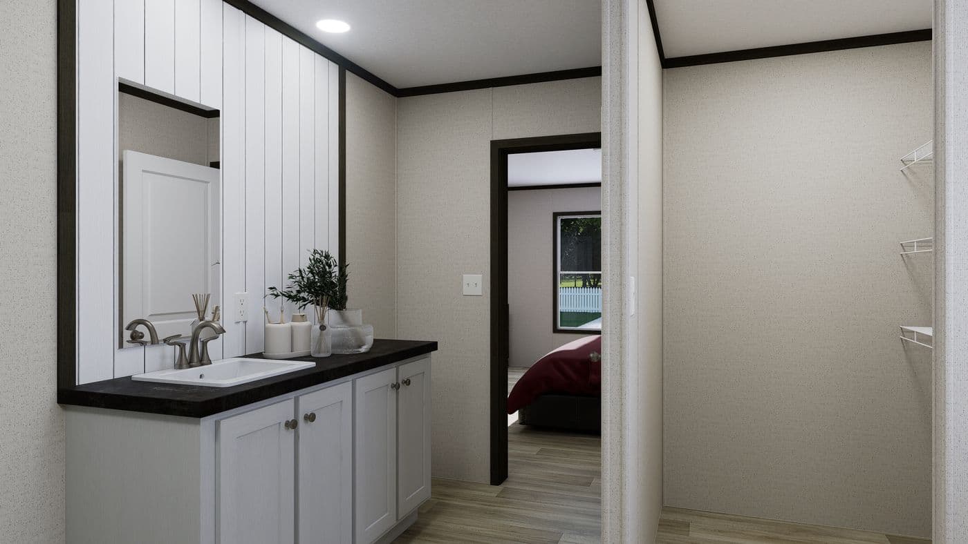 The PURPOSE Exterior. This Manufactured Mobile Home features 4 bedrooms and 2 baths.