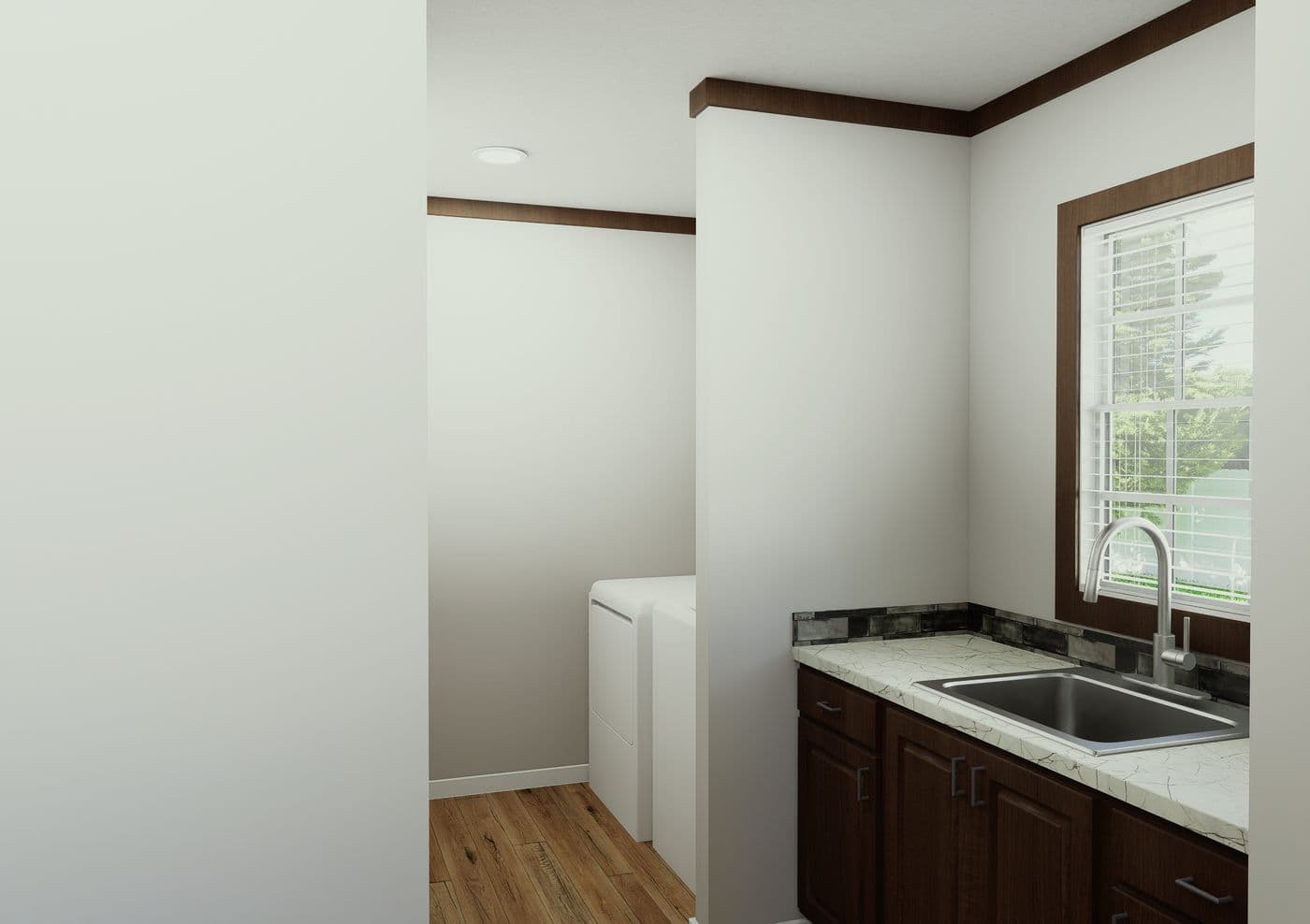 The THE ELITE Utility Room. This Manufactured Mobile Home features 3 bedrooms and 2 baths.