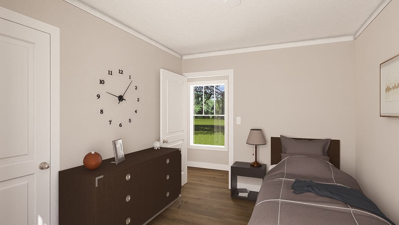 The SWEET CAROLINE Guest Bedroom. This Manufactured Mobile Home features 3 bedrooms and 2 baths.
