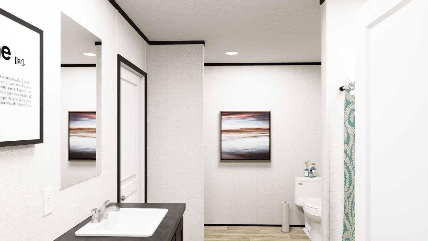 The SOLACE Primary Bathroom. This Manufactured Mobile Home features 4 bedrooms and 2 baths.