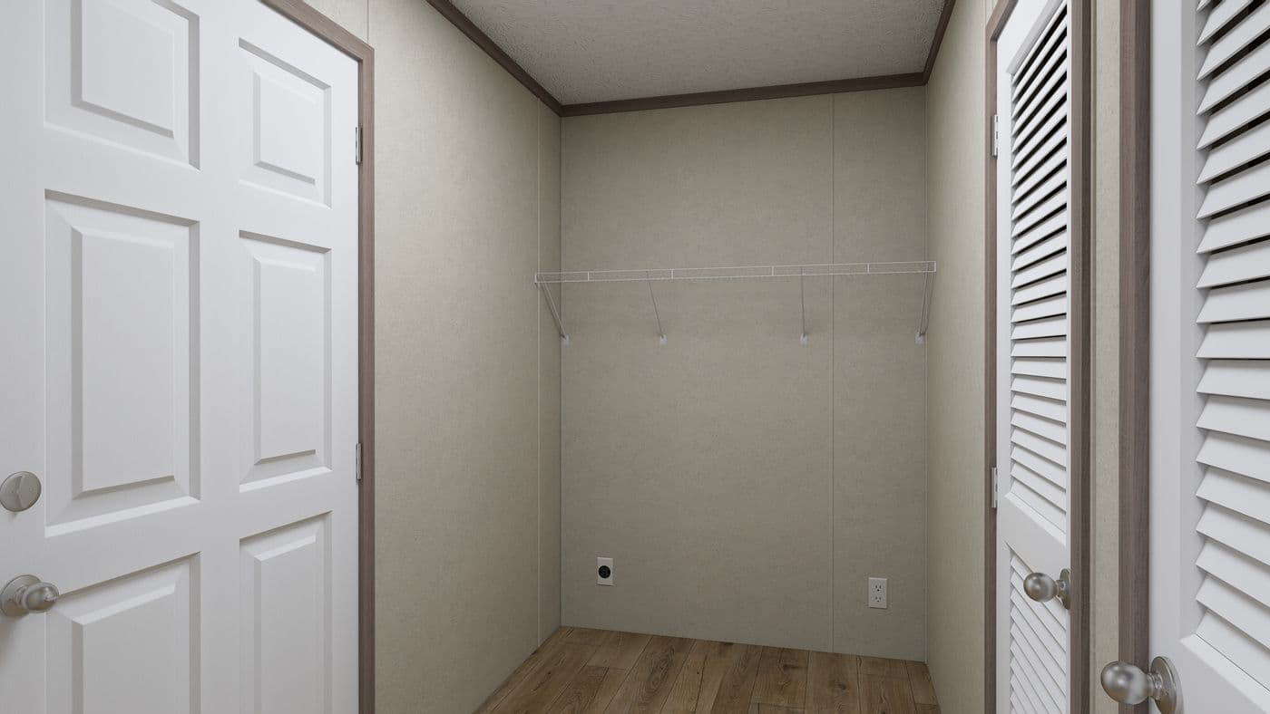 The 5628-CC52 COMPASS 56 Utility Room. This Manufactured Mobile Home features 3 bedrooms and 2 baths.