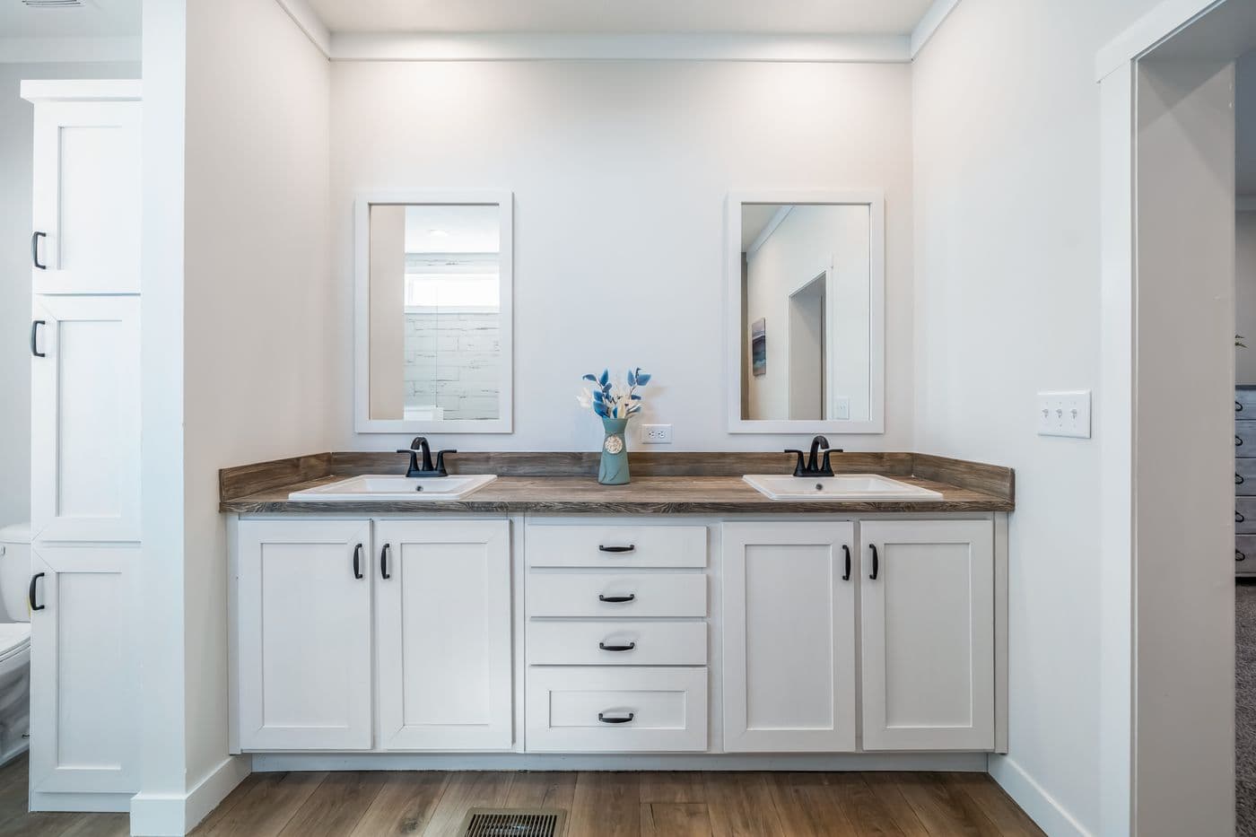 The 3459 MOD 64X28 CAROLINA Primary Bathroom. This Modular Home features 3 bedrooms and 2 baths.