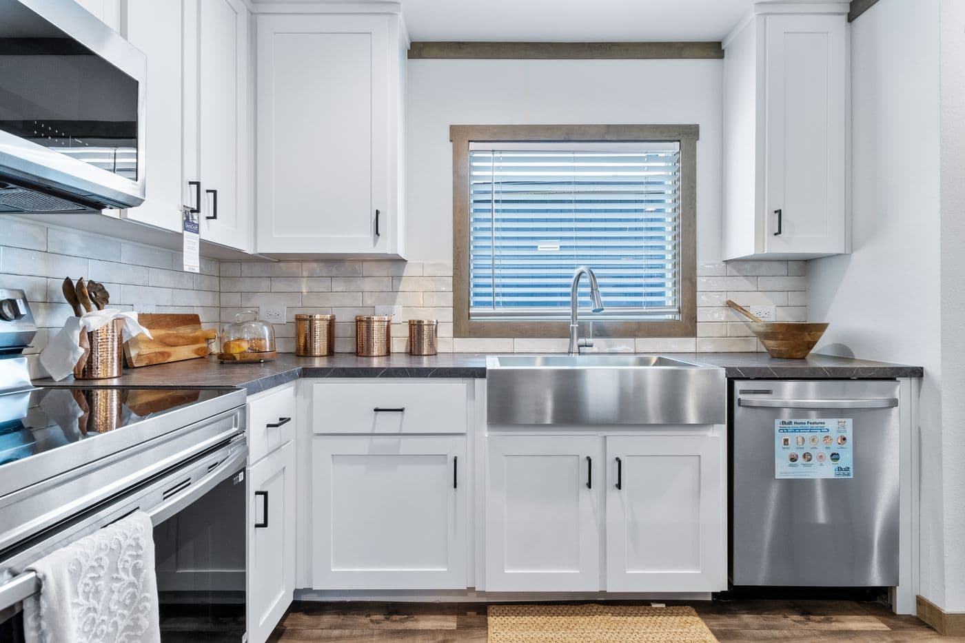 The SAWYER ELITE Kitchen. This Manufactured Mobile Home features 3 bedrooms and 2 baths.