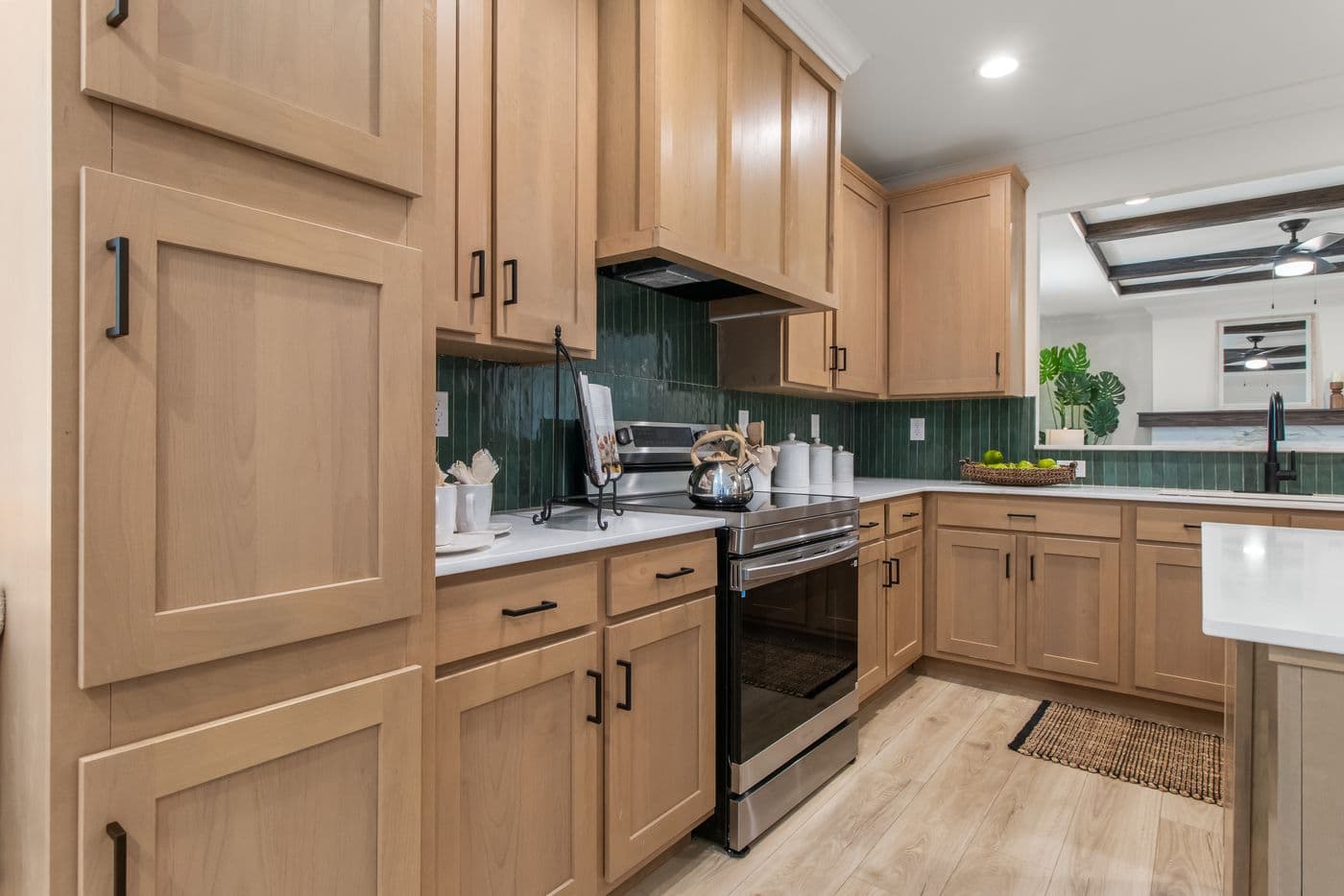 The THE VALENTINO Kitchen. This Manufactured Mobile Home features 4 bedrooms and 2.5 baths.