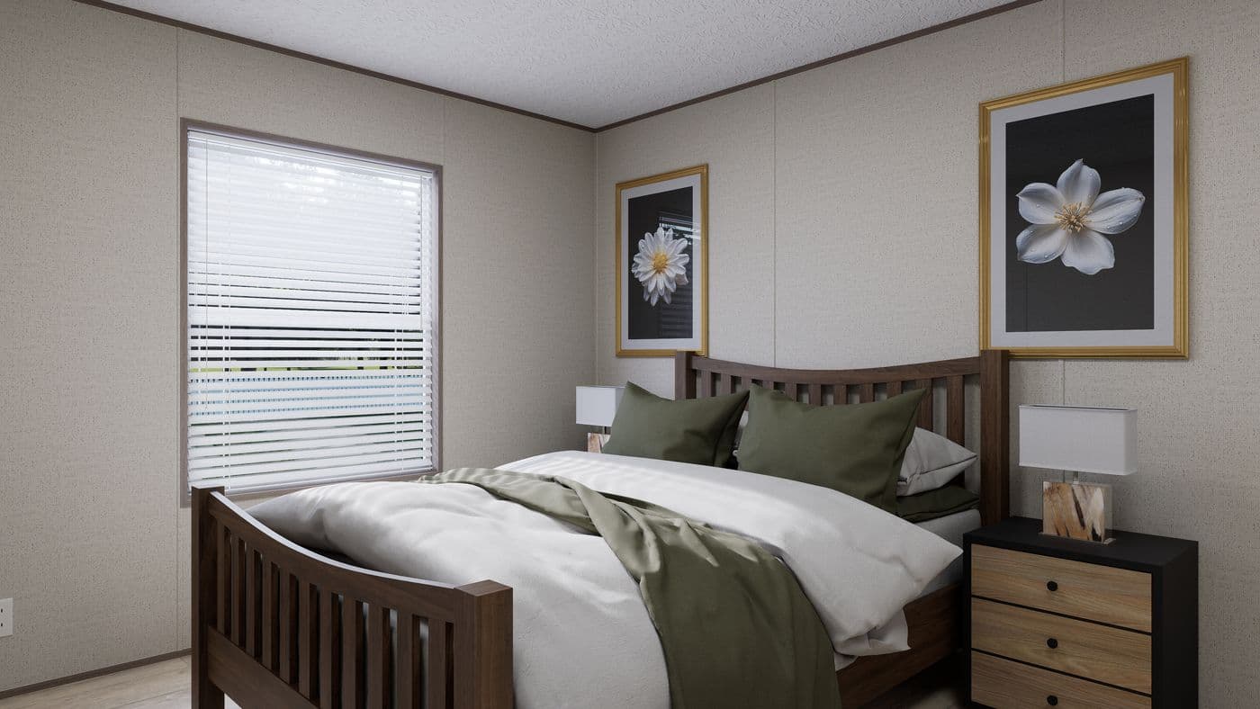The GLACIER RIDGE Primary Bedroom. This Manufactured Mobile Home features 2 bedrooms and 1 bath.