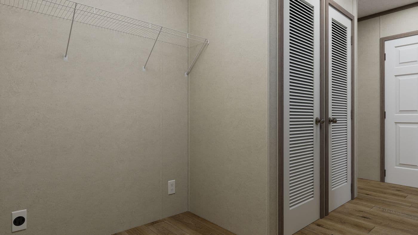 The 7216-CC01 CORNERSTONE 72 Utility Room. This Manufactured Mobile Home features 3 bedrooms and 2 baths.