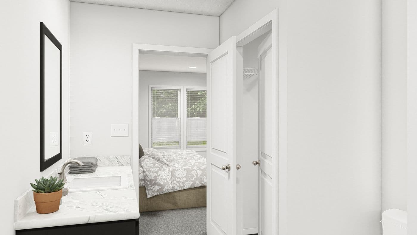 The DRM486F 48' DREAM Primary Bathroom. This Manufactured Mobile Home features 4 bedrooms and 2 baths.
