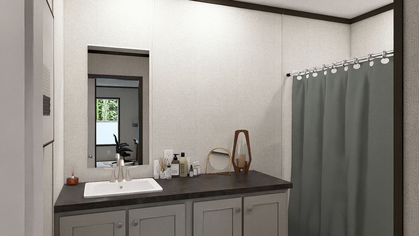 The AMBITION Guest Bathroom. This Manufactured Mobile Home features 4 bedrooms and 2 baths.