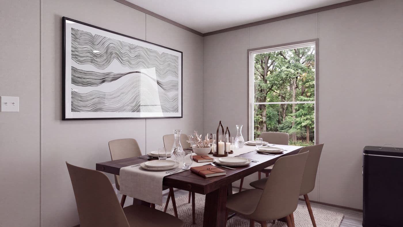 The THE MOUNTAINEER 60 Dining Area. This Manufactured Mobile Home features 3 bedrooms and 2 baths.