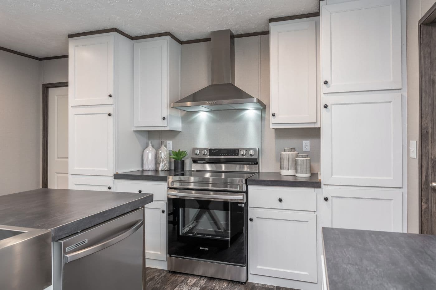 The THE GENERAL Kitchen. This Manufactured Mobile Home features 3 bedrooms and 2 baths.