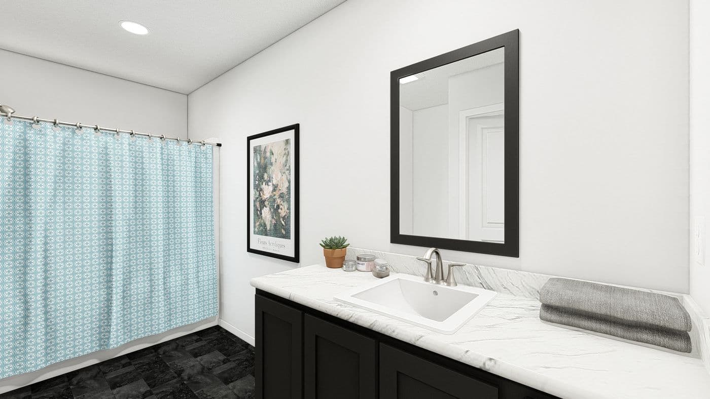 The DRM486F 48' DREAM Primary Bathroom. This Manufactured Mobile Home features 4 bedrooms and 2 baths.
