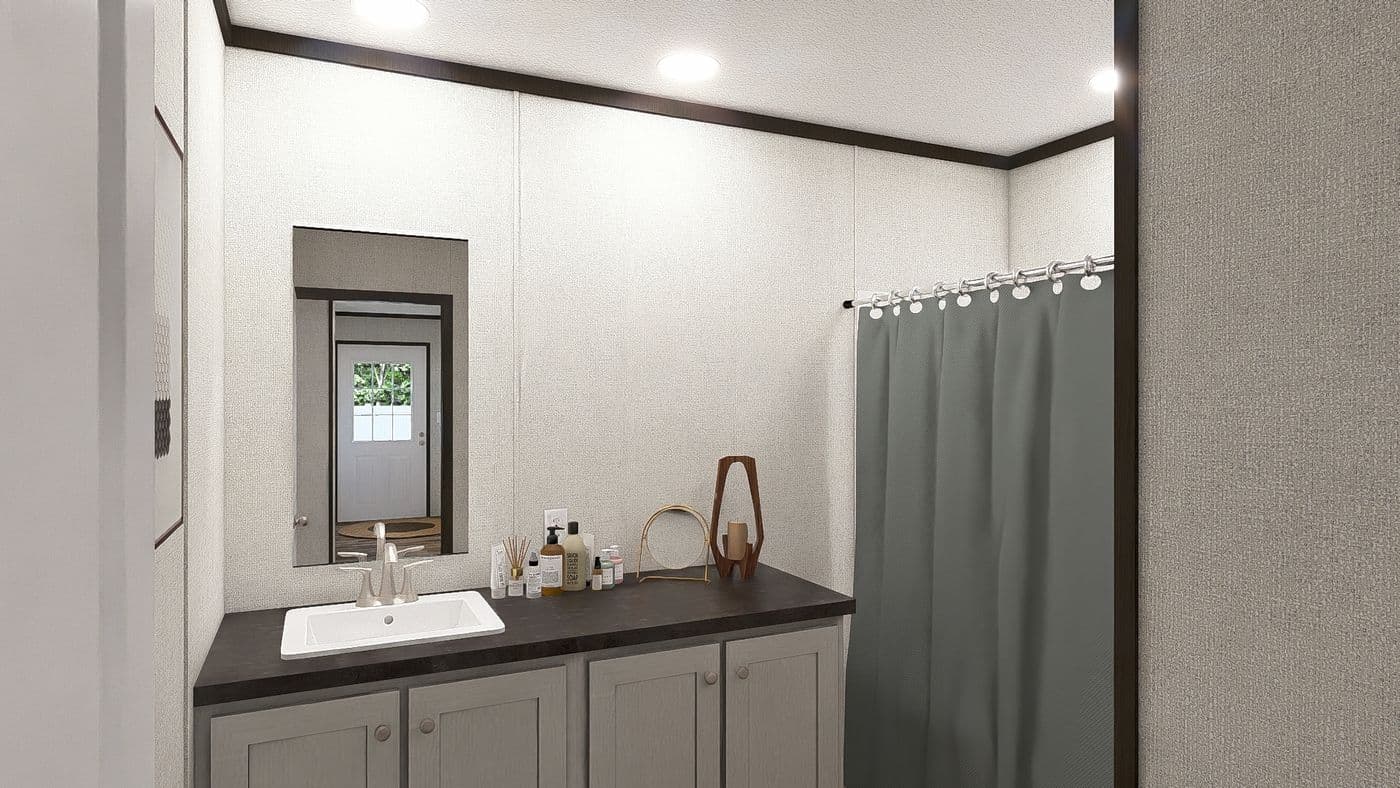 The OCCASION Guest Bathroom. This Manufactured Mobile Home features 4 bedrooms and 2 baths.