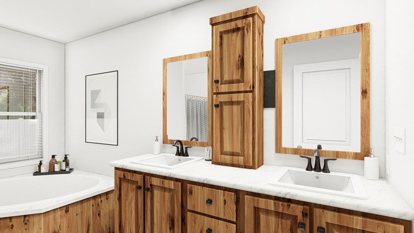 The ING681F EUCALYPTUS GW Primary Bathroom. This Manufactured Mobile Home features 3 bedrooms and 2 baths.