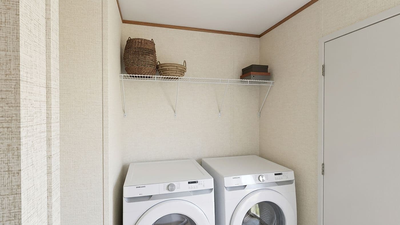 The MAPLE Utility Room. This Manufactured Mobile Home features 3 bedrooms and 2 baths.