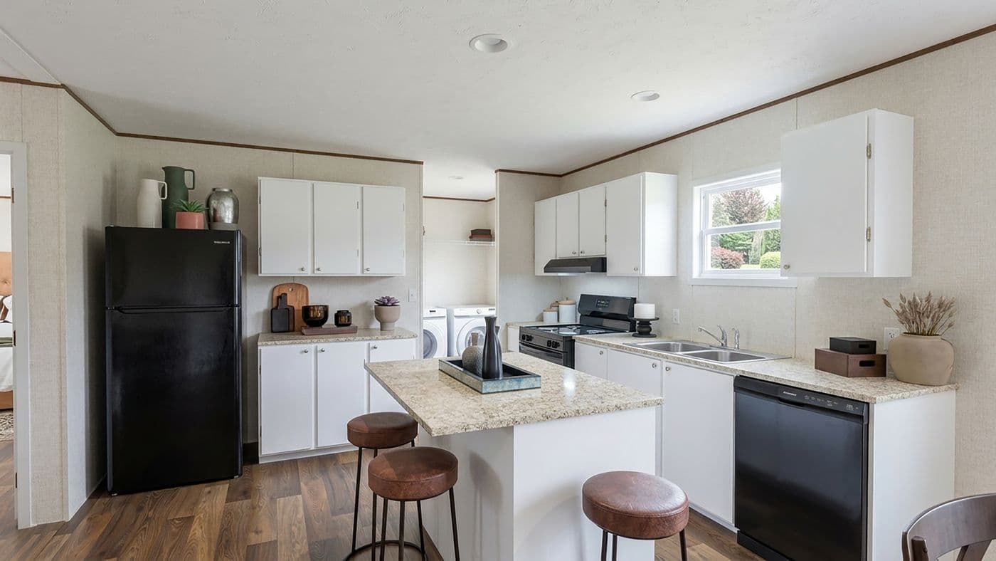 The MAPLE Kitchen. This Manufactured Mobile Home features 3 bedrooms and 2 baths.