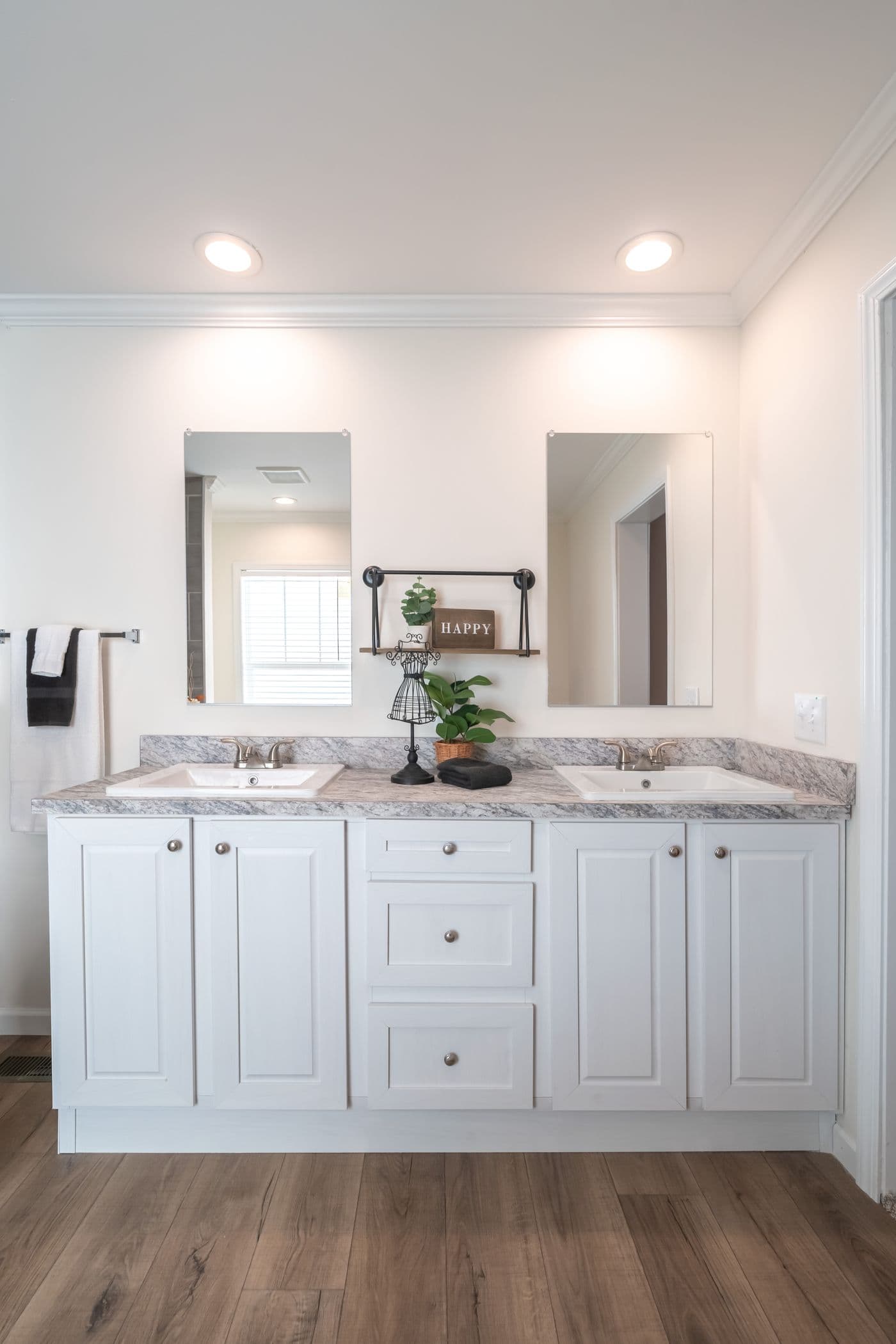 The 4210 "CAROLINA" 5628 Primary Bathroom. This Manufactured Mobile Home features 3 bedrooms and 2 baths.