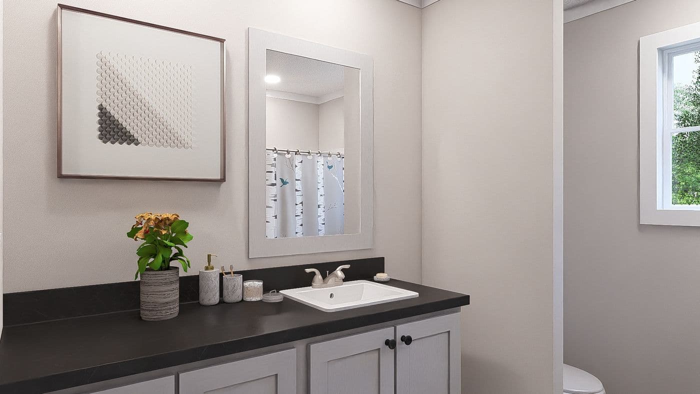 The ROCKET MAN Guest Bathroom. This Modular Home features 3 bedrooms and 2 baths.