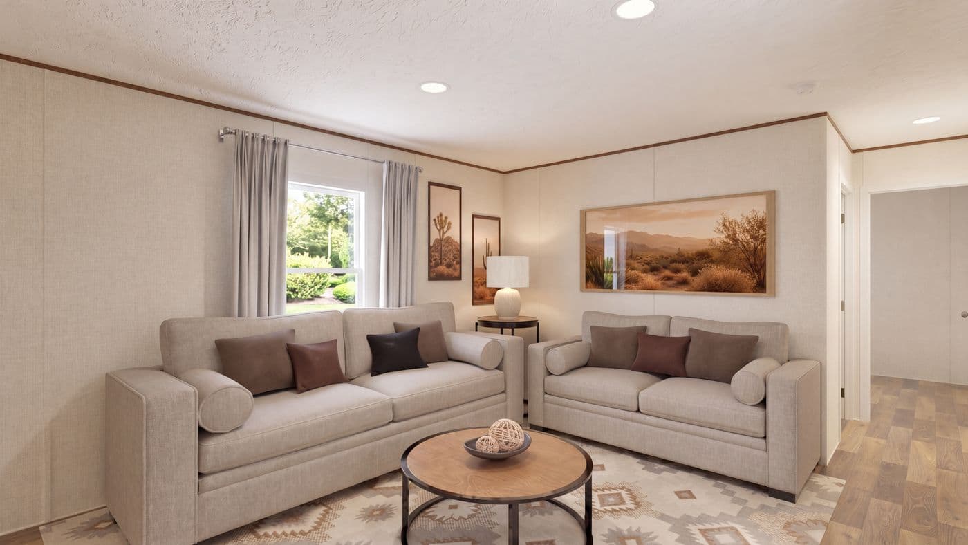 The DOGWOOD Living Room. This Manufactured Mobile Home features 2 bedrooms and 2 baths.