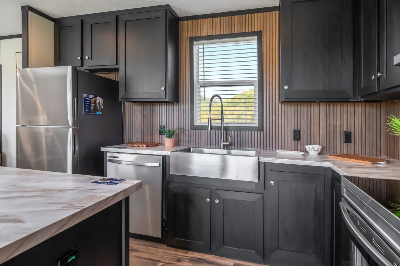 The RAVENWOOD Kitchen. This Manufactured Mobile Home features 3 bedrooms and 2 baths.