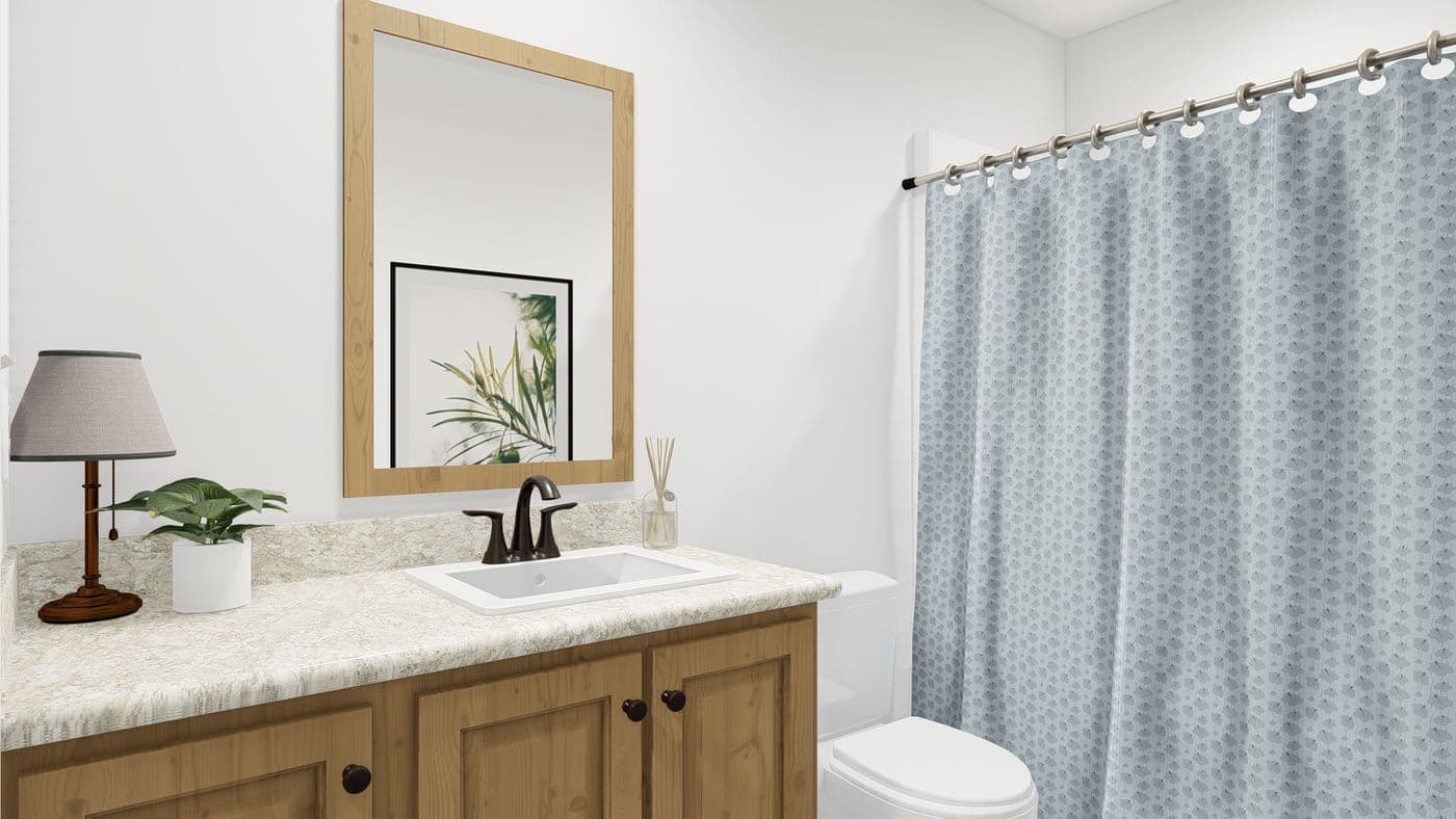 The ING382F REDWOOD II GW Guest Bathroom. This Manufactured Mobile Home features 2 bedrooms and 2 baths.