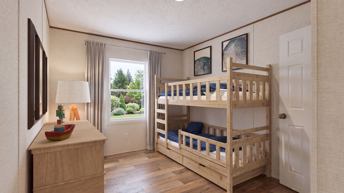 The CEDAR Guest Bedroom. This Manufactured Mobile Home features 3 bedrooms and 2 baths.