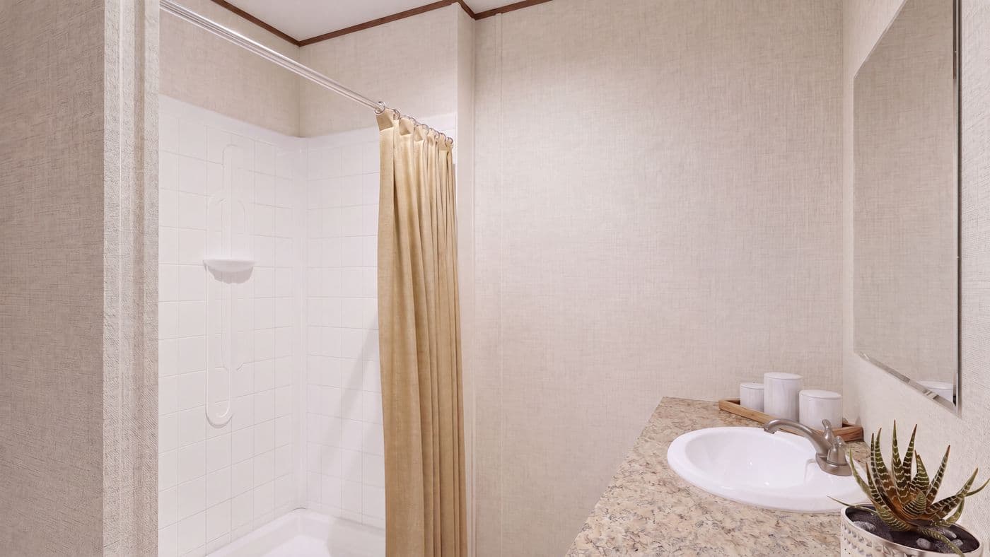 The CEDAR Primary Bathroom. This Manufactured Mobile Home features 3 bedrooms and 2 baths.