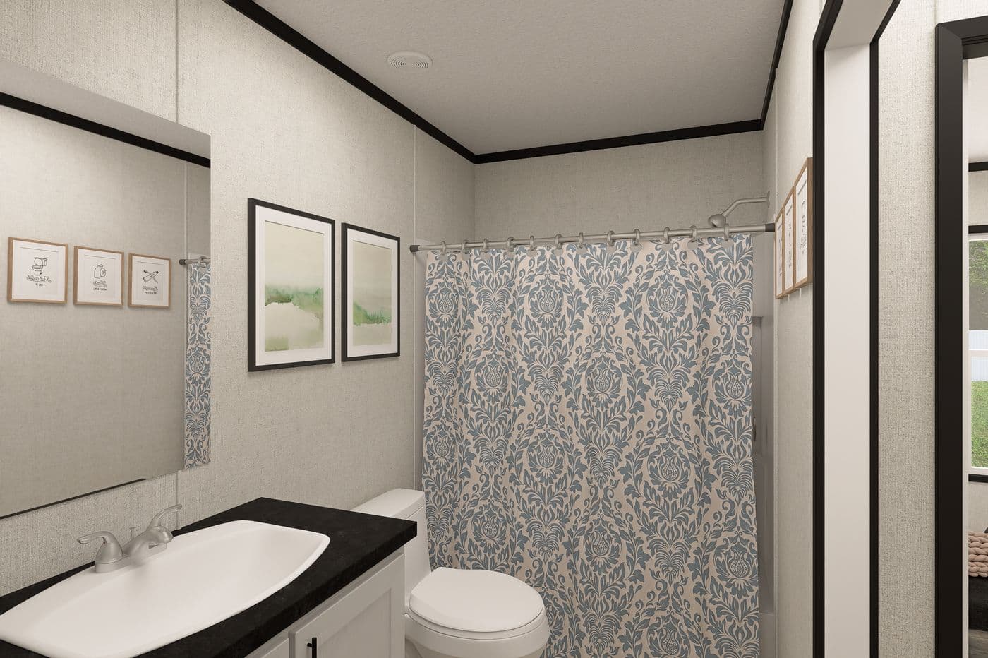 The THE MOUNTAINEER 48 Guest Bathroom. This Manufactured Mobile Home features 3 bedrooms and 2 baths.